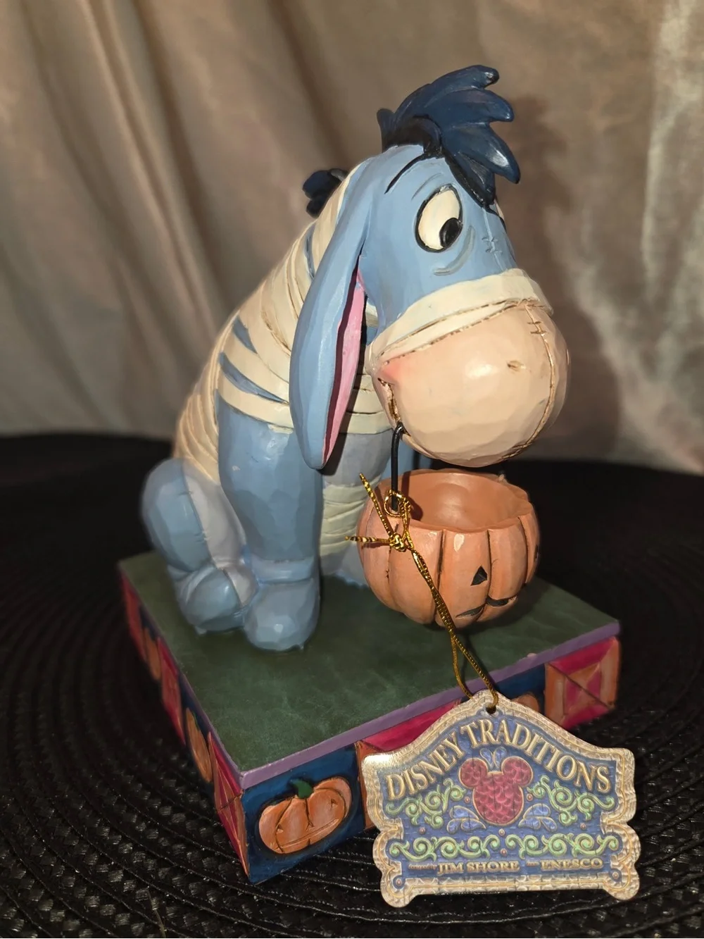 Disney eeyore holding